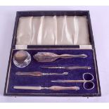 A CASED SILVER VANITY MANICURE SET. Birmingham 1936.