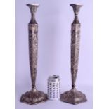 A VERY LARGE PAIR OF 19TH CENTURY CONTINENTAL WHITE METAL CANDLESTICKS