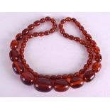 AN EARLY 20TH CENTURY AMBER NECKLACE.70 grams. 70 cm long.Good Condition