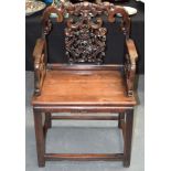 A 19TH CENTURY CHINESE CARVED HARDWOOD CHAIR with extensively carved back splat, formed with bats