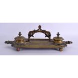 A 19TH CENTURY FRENCH GOTHIC REVIVAL BRONZE DOUBLE INKWELL of rectangular form with open work