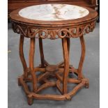 AN EARLY 20TH CENTURY CHINESE CARVED HARDWOOD MARBLE INSET FOLDING TABLE with fruiting vine frees