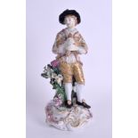 AN 18TH CENTURY DERBY FIGURE OF A BAGPIPER modelled upon a naturalistic base. 18 cm high.Restored