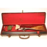 AN ARMY & NAVY 12 BORE SIDE BY SIDE SHOTGUN, with 30" nitro proofed barrels, automatic safety,