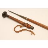 A SPEAR/SWORD STICK, the top section with horn knob and leather grip screwing off to reveal a 3 1/2"