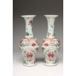 A PAIR OF CHINESE PORCELAIN VASES, of inverted baluster form with waisted cylindrical necks and