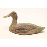 A WOODEN DECOY DUCK, late 19th/early 20th century, the carved and painted body with two drill