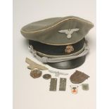 A GERMAN THIRD REICH OFFICER'S CAP, with death head skull badge, eagle badge and later rope,