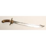 A GERMAN HUNTING SWORD, the 18" clip point blade etched with foliate scrolls and stamped TJI-K-R-