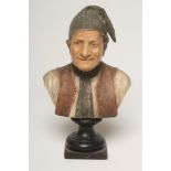 AN ERNST WAHLISS TERRACOTTA BUST, late 19th century, modelled as an Austrian peasant wearing a