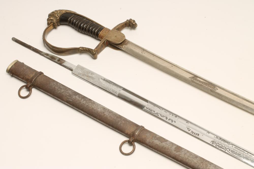 A DUTCH INFANTRY OFFICER'S SWORD, with 34" curved blade inscribed "YZERHOUWER", brass hilt with lion