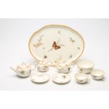 A WEDGWOOD CREAMWARE TETE-A-TETE, 1893, printed and over-painted in colours with butterflies, moths,