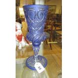 A BOHEMIAN GLASS GOBLET, the baluster bowl on a single knopped panelled stem and wrythen