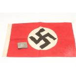 A SECOND WORLD WAR GERMAN FLAG, with red field and central swastika, 19" x 12", together with a