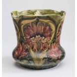 A MACINTYRE MOORCROFT POTTERY FLORIAN JARDINIERE, early 20th century, of baluster form with