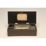 A SWISS MUSICAL BOX, 19th century, playing six airs as listed on the tune sheet, comb and 6 1/4"