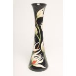 A MOORCROFT POTTERY VASE, modern, of slender swept cylindrical form, tubelined and painted by