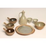 A COLLECTION OF ST. IVES STUDIO STANDARD WARES, comprising a set of three single handled bowls