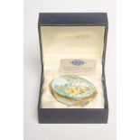 A MOORCROFT ENAMEL BOX AND HINGED COVER, modern, of oval form, painted in soft colours with the "