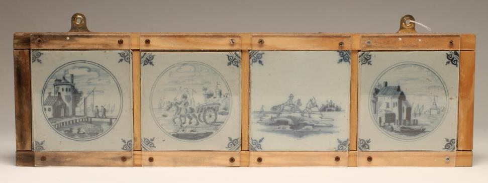 A SET OF FOUR DUTCH DELFT TILES, late 18th century, painted in blue, one with a vignette of an