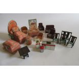 A collection of dolls house furniture, 1930's, comprising a tangerine satin covered six piece
