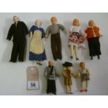 A collection of six Caho doll's house dolls, 5 1/2" to 3 1/4", together with a pair of German bisque