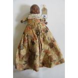 An Armand Marseille bisque head Mulatto baby doll with brown glass sleeping eyes, closed mouth,