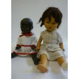 Three hard plastic dolls comprising a girl doll, 25" high, and two black dolls, 19" high and 21"