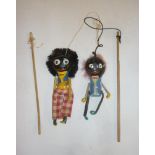 Two Golly puppets in dressed and painted composition with wire limbs, 5 3/4" and 4 1/2" high
