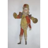 A Schoenau & Hoffmeister mechanical doll with bisque head, fixed blue glass eyes, painted wooden