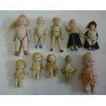 A collection of ten all bisque dolls house dolls, five fully jointed, tallest 4 1/2" high,