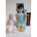 An Armand Marseille bisque head "Dream Baby" doll with blue glass sleeping eyes, closed mouth,