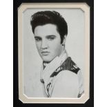 Elvis Presley, photograph signed in blue ballpoint, 5 1/4" x 3 1/2" Provenance: Vendor's mother