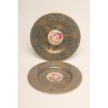 A PAIR OF ROYAL WORCESTER CHINA CABINET PLATES, 1918, of plain circular form, centrally painted in