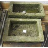 A SMALL OBLONG SANDSTONE TROUGH, 20 1/2" x 7", together with another similar, 17 1/2" x 11" x 7" (2)