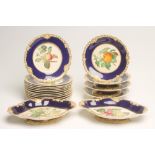 A VICTORIAN STAFFORDSHIRE PORCELAIN DESSERT SERVICE, centrally painted in polychrome enamels with