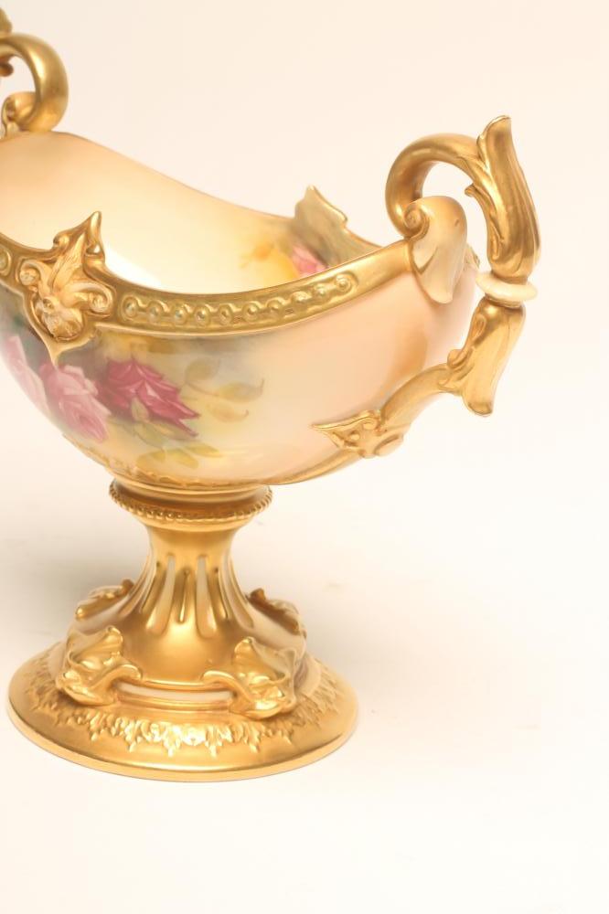 A ROYAL WORCESTER CHINA PEDESTAL BOWL, 1928, of boat form with two leaf sheathed scroll handles on a - Image 2 of 2
