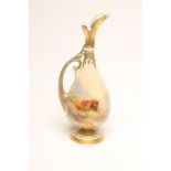A ROYAL WORCESTER CHINA EWER, c.1926, of rounded conical form with high lip and "C" scroll handle,