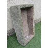 A SANDSTONE TROUGH of oblong form, well cut, 29" x 15 1/2" x 8 1/2" (Est. plus 21% premium inc.