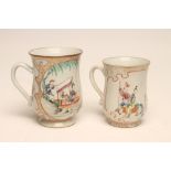 TWO CHINESE EXPORT PORCELAIN MUGS, each of baluster form painted in polychrome enamels, the larger