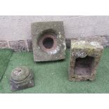 A SANDSTONE DRAIN SURROUND of rough hewn square form with central opening, 16 1/2" x 6", together