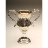 A MID VICTORIAN SILVER TROPHY CUP, maker Hilliard & Thomason, Birmingham 1867, the baluster bowl
