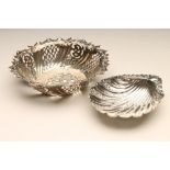 A LATE VICTORIAN SILVER BONBON DISH, maker's mark H.T., London 1891, of wrythen fluted circular form