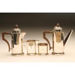 AN ART DECO SILVER COMPOSITE FOUR PIECE CAFE-AU-LAIT SET, maker Charles Green & Co. Ltd., Birmingham