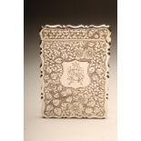 A LATE VICTORIAN SILVER VISITING CARD CASE, maker George Unite, Birmingham 1896, of shaped oblong