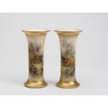A PAIR OF ROYAL WORCESTER CHINA VASES, 1918, of waisted cylindrical form, painted in polychrome