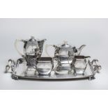 A SILVER FIVE PIECE TEA AND COFFEE SERVICE, maker James R. Ogden & Sons Ltd., Sheffield 1949, of