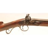 A FLINTLOCK SPORTING GUN, c.1815, with 32" sighted barrel octagonal at the breech, stepped lock,