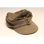 A THIRD REICH ARMY FORAGE CAP of typical form with triangular stitched patch, 9 3/4" front to