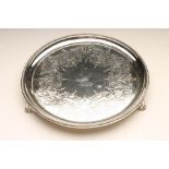 A VICTORIAN SILVER SALVER, maker Hawksworth, Eyre & Co., Sheffield 1866, of plain circular form with